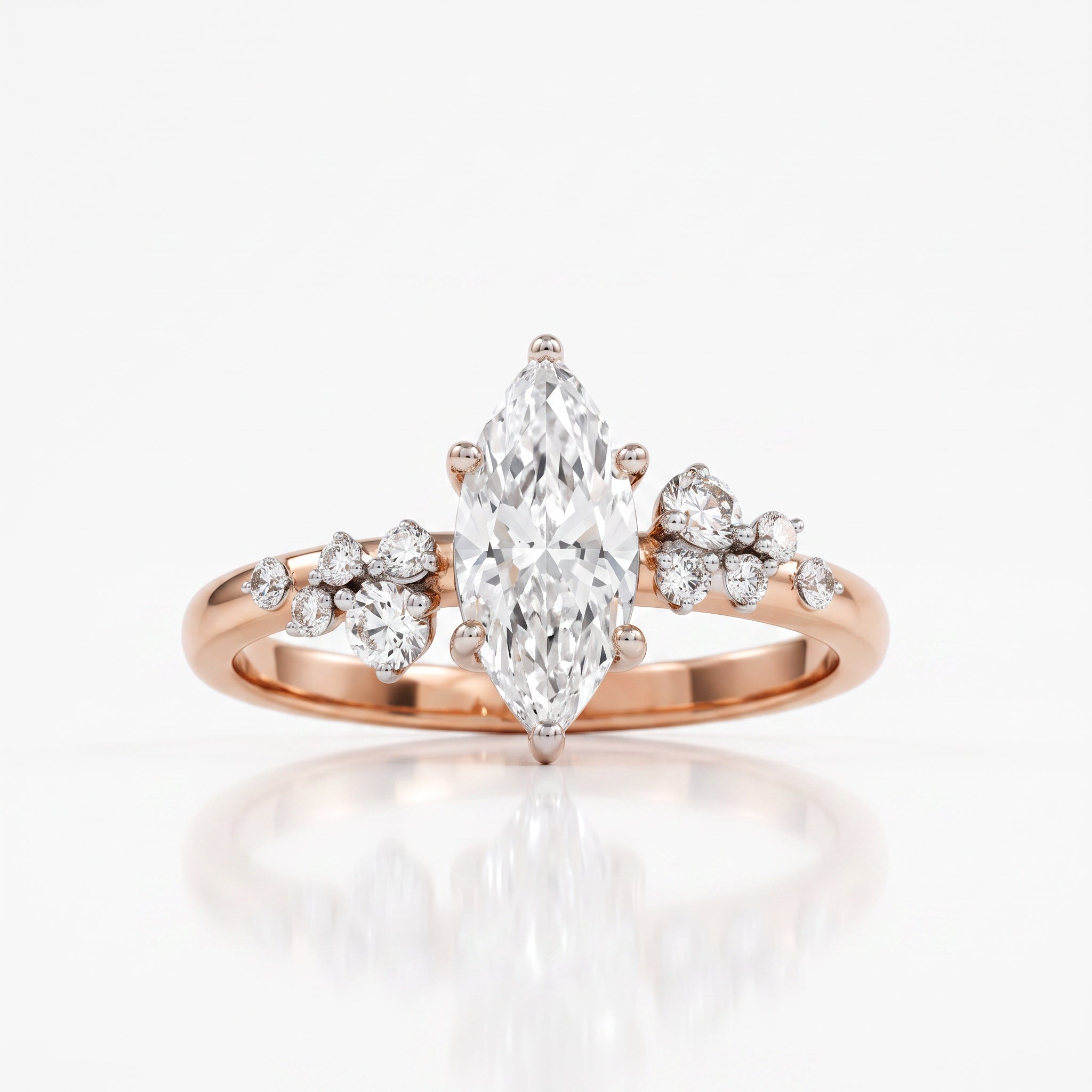 A rose gold engagement ring featuring a marquise-cut diamond center stone and smaller round diamonds on the shoulders, set against a clean white background with a soft reflection.