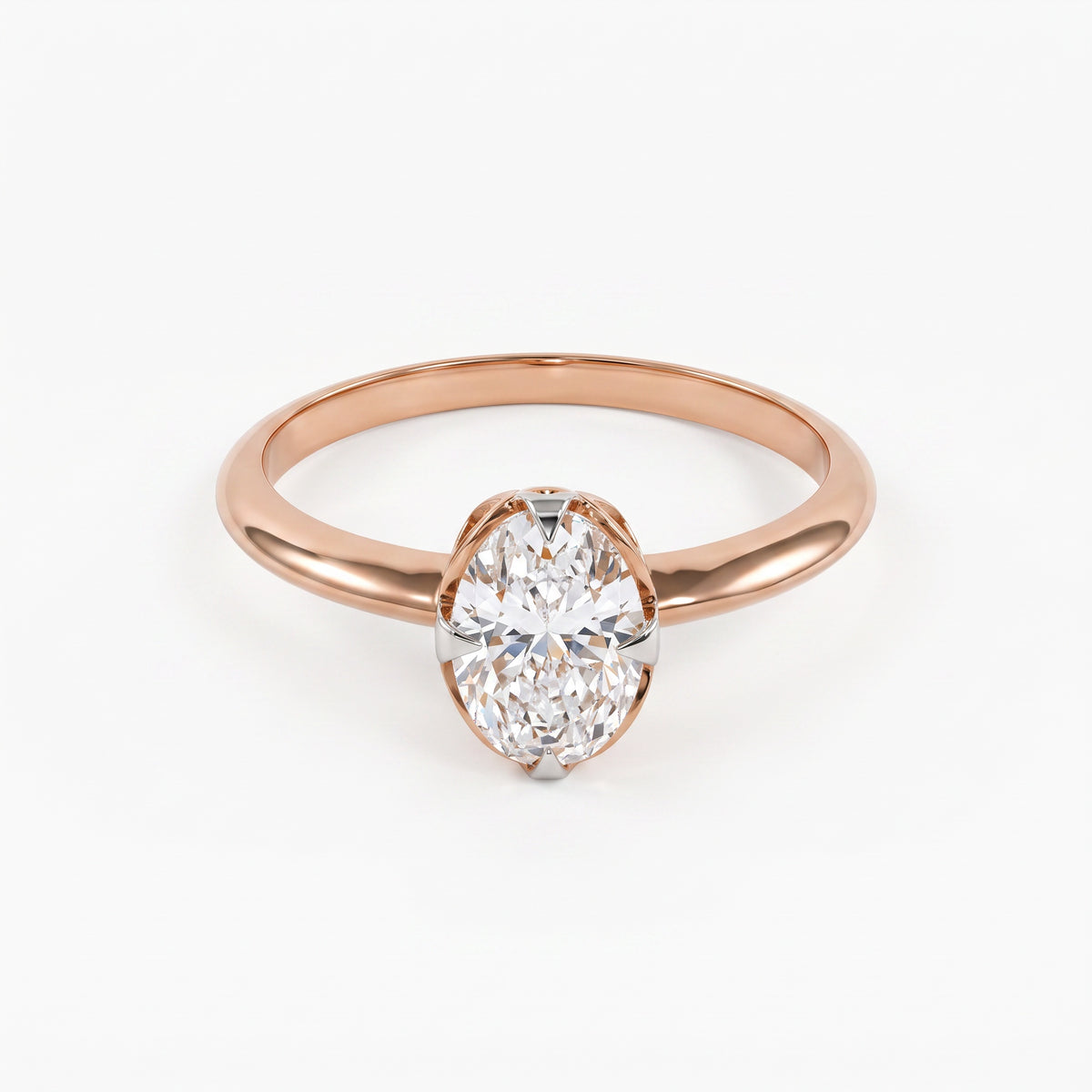 A yellow gold solitaire ring featuring a marquise-cut diamond set in a silver-colored prong, shown on a clean white background.
