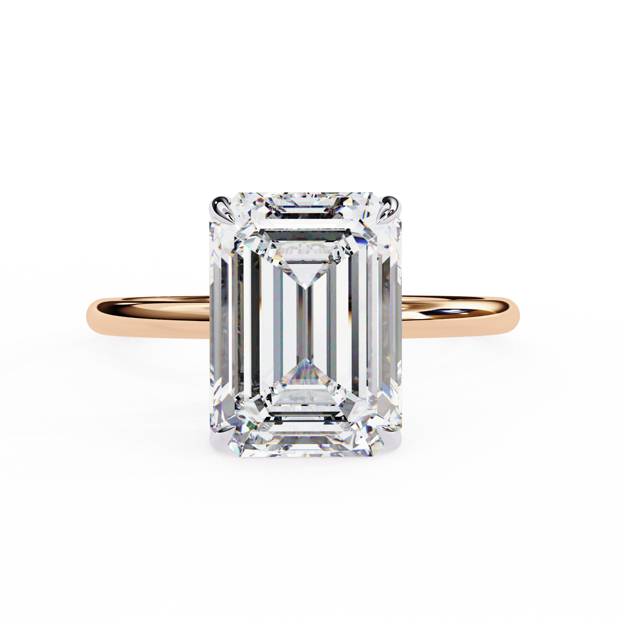 An emerald cut diamond ring with a yellow gold band and a clear, colorless appearance.