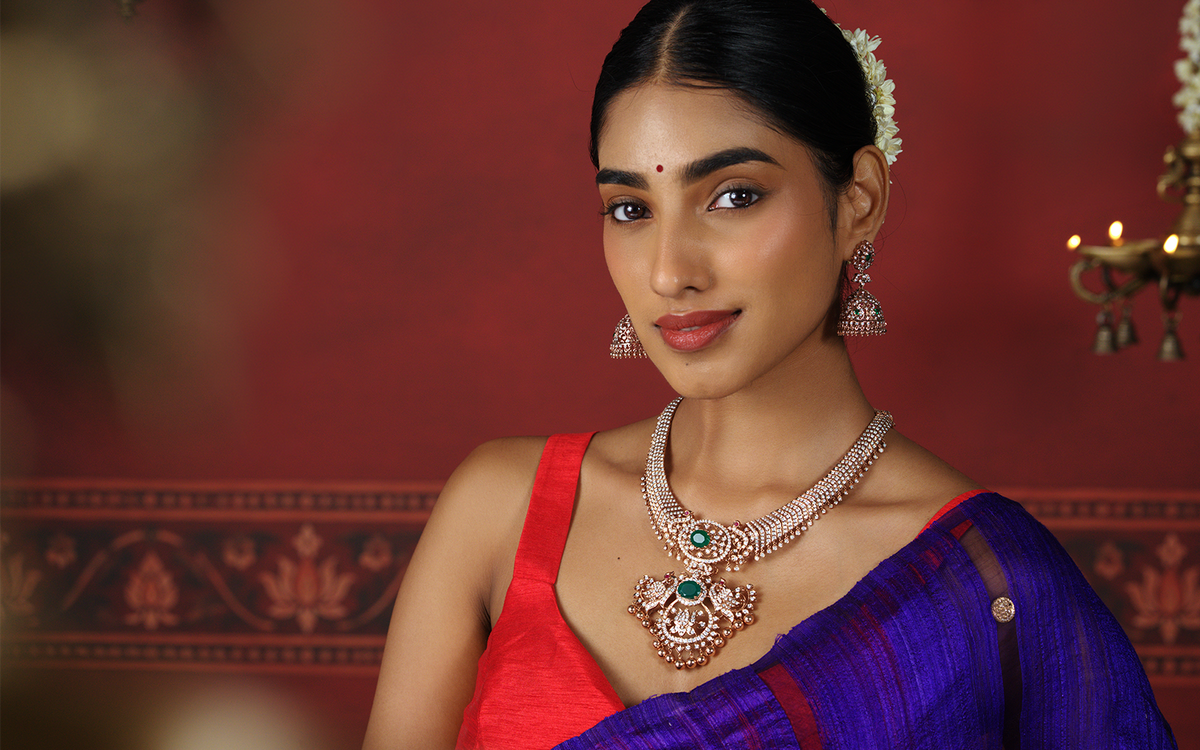 Model wearing traditional statement jewellery