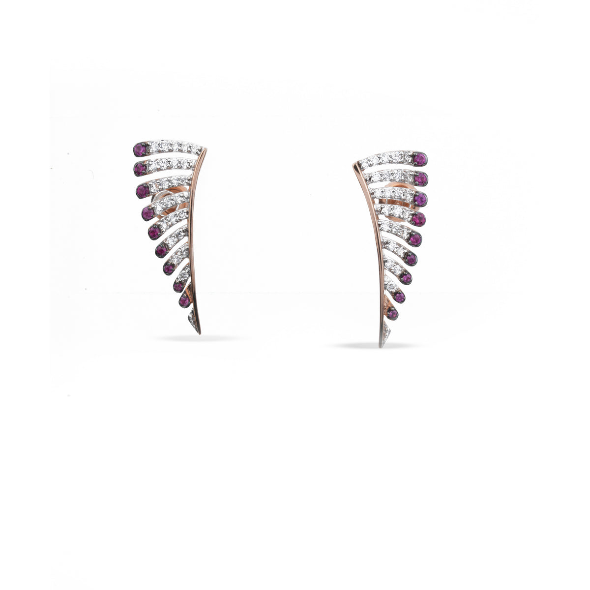 A pair of curved, fan-shaped stud earrings in rose gold, featuring rows of clear pavé stones and small round purple gemstones along the outer edges, set against a plain white background.