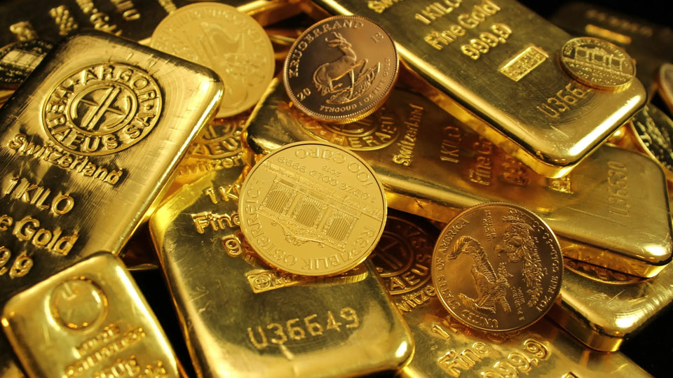 Gold bars and coins arranged together
