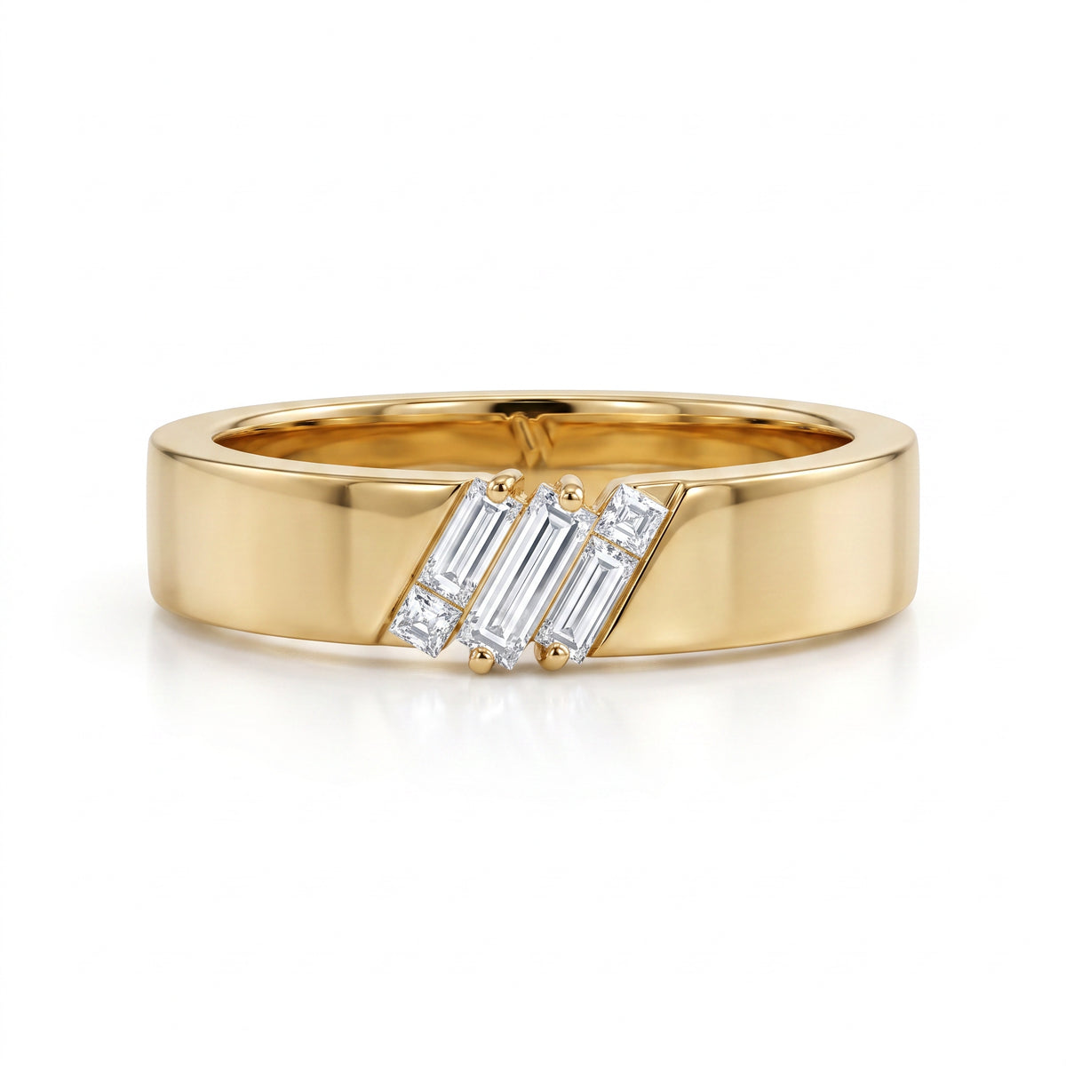 A polished yellow gold ring with three diagonal rows of baguette-cut clear gemstones, shown on a clean white background.