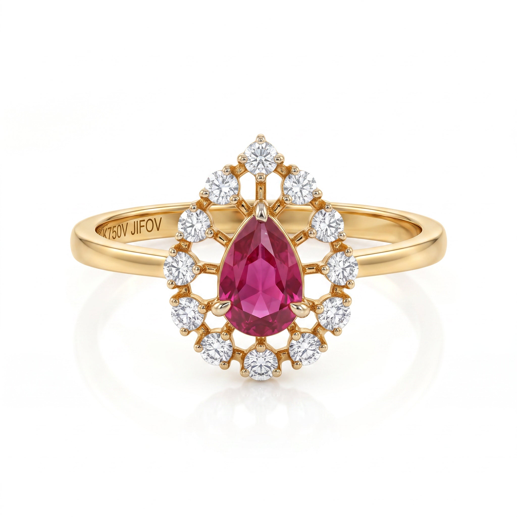 A gold ring featuring a central pear-cut pink gemstone surrounded by a halo of round clear stones, shown on a clean white background with a soft reflection.