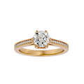 A gold diamond solitaire ring with smaller diamonds on the band, showcasing a large central diamond.