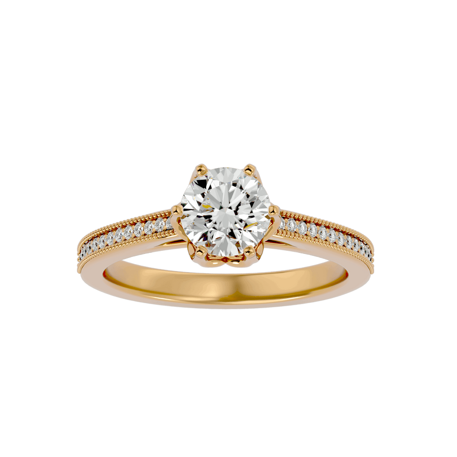 A gold diamond solitaire ring with smaller diamonds on the band, showcasing a large central diamond.