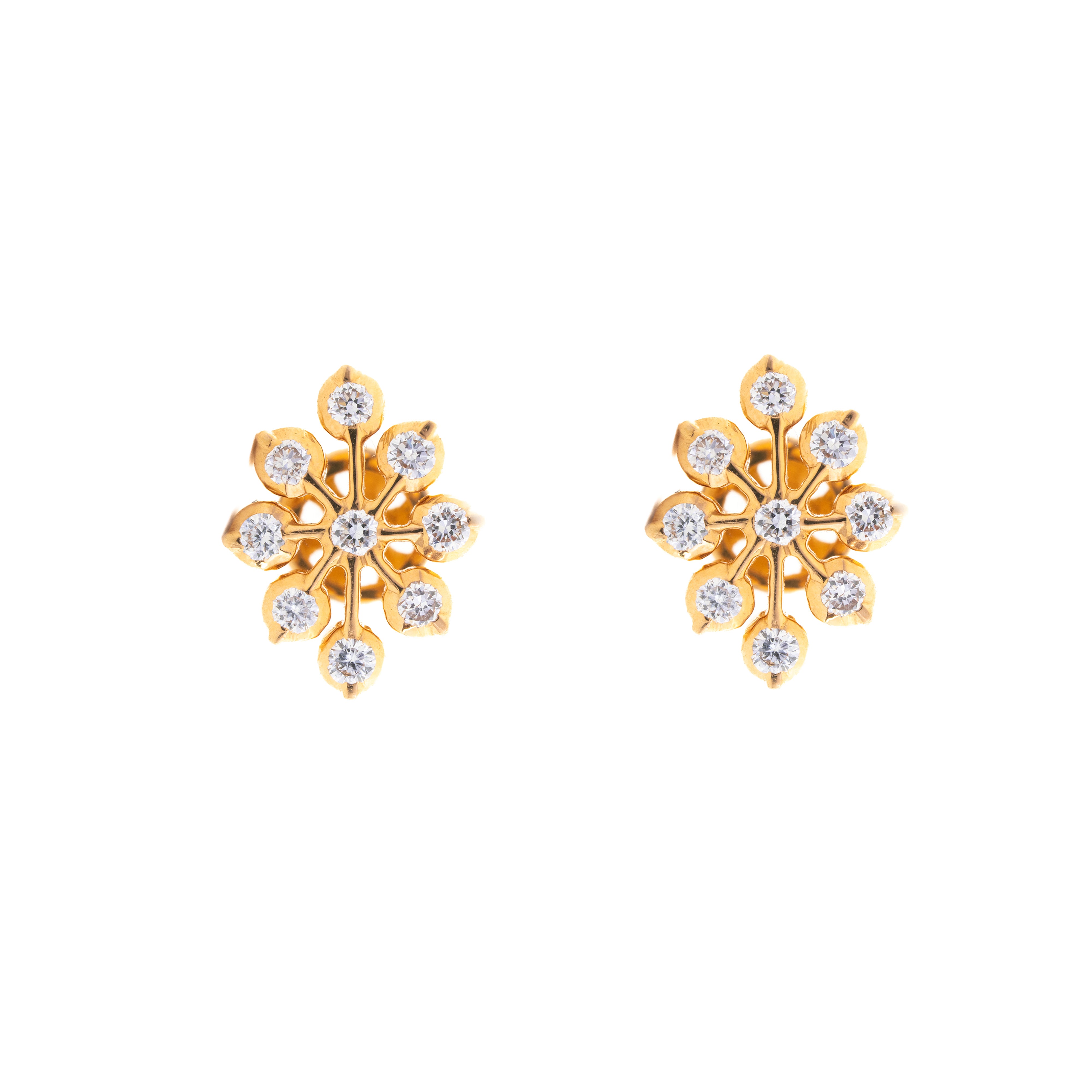 Gold snowflake earrings with clear gemstones on a white background