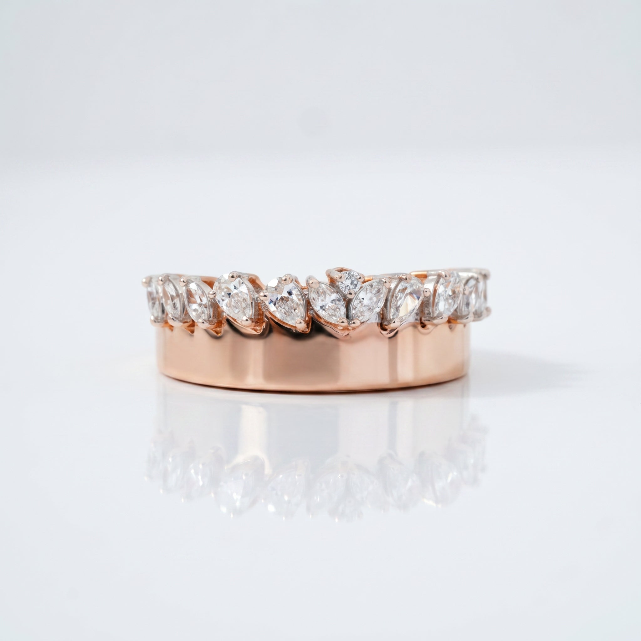 Marquise cut lab grown diamond eternity band ring in rose gold with shared prong setting by Glora Diamonds Chennai