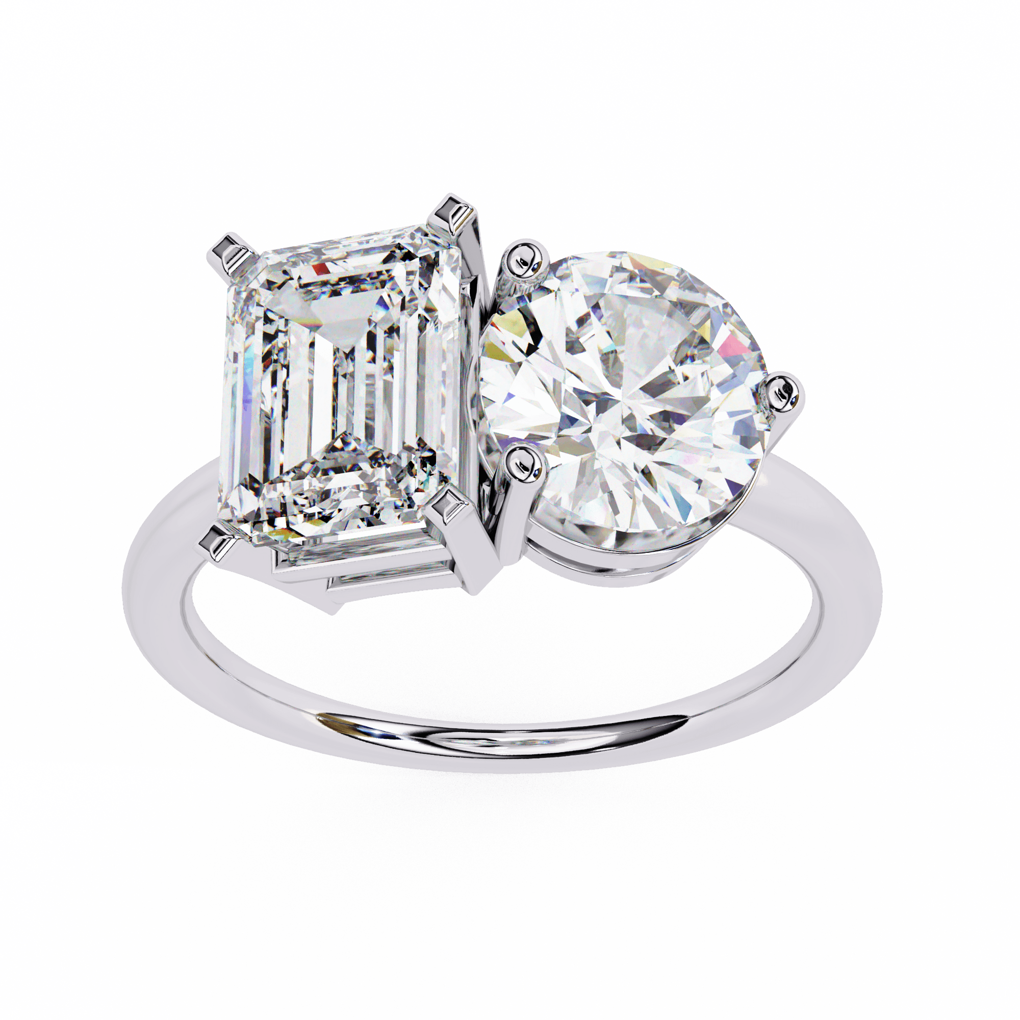 A silver-colored band diamond ring with one large round diamond and one large emerald-cut diamond side by side.