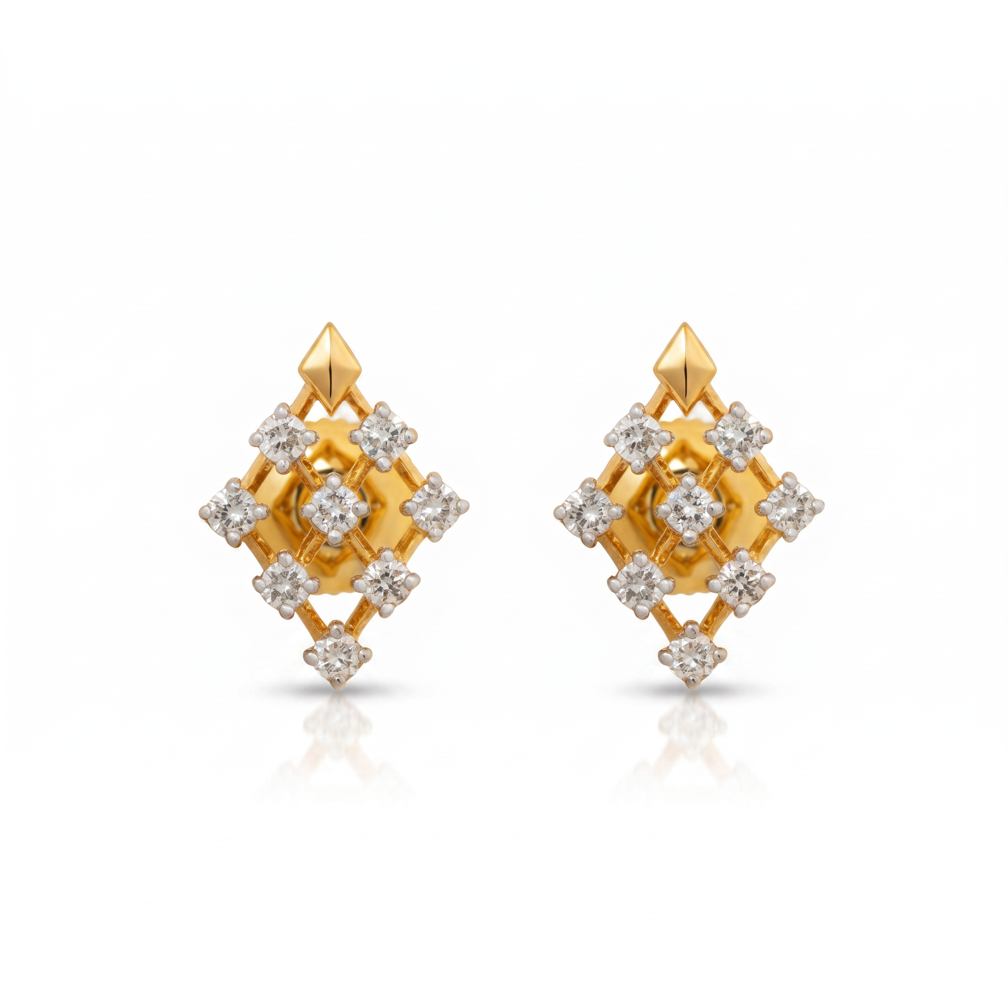 Gold earrings with diamond-like stones on a white background