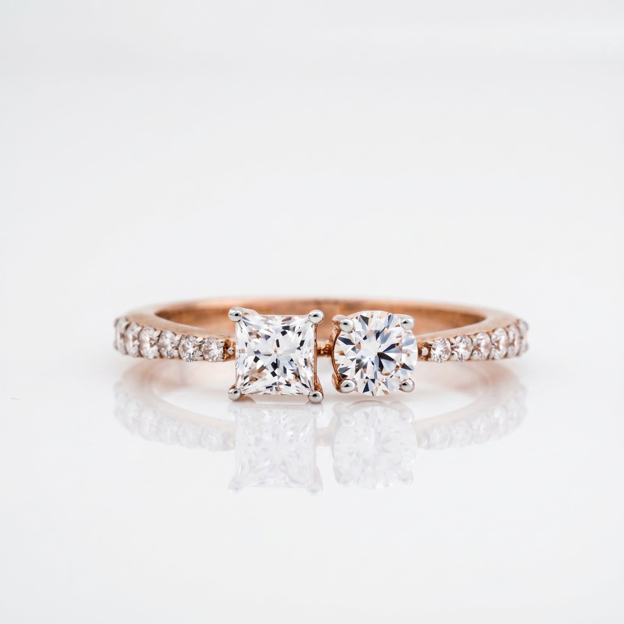 Princess cut and round brilliant diamond Toi et Moi ring with pavé diamond band in rose gold by Glora Diamonds Chennai