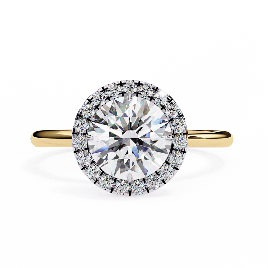 A round diamond ring with smaller diamonds around it, set in a gold band.