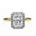 A yellow gold diamond ring with a large central diamond surrounded by smaller diamonds set in a ring band.