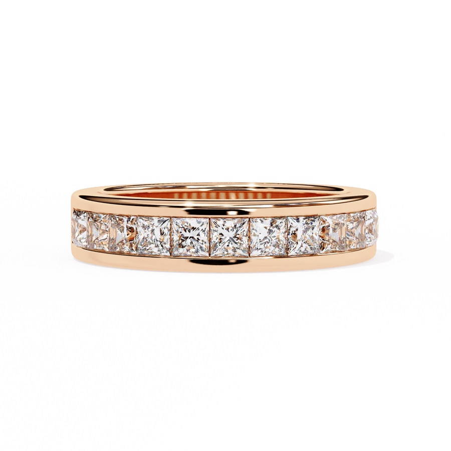 A gold band ring with multiple diamonds arranged in a line.