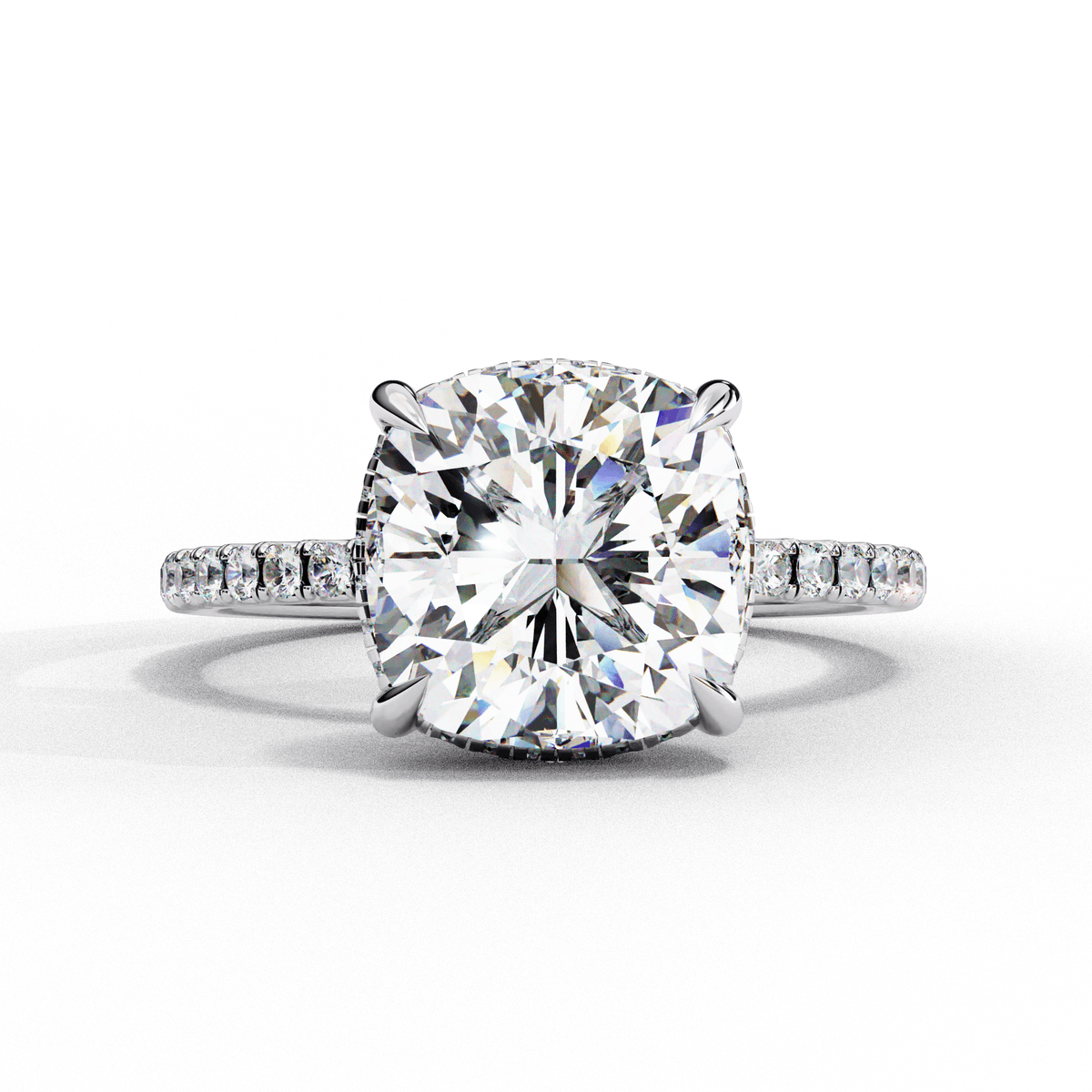 A round diamond ring with a white gold band, surrounded by smaller diamonds set in a ring.