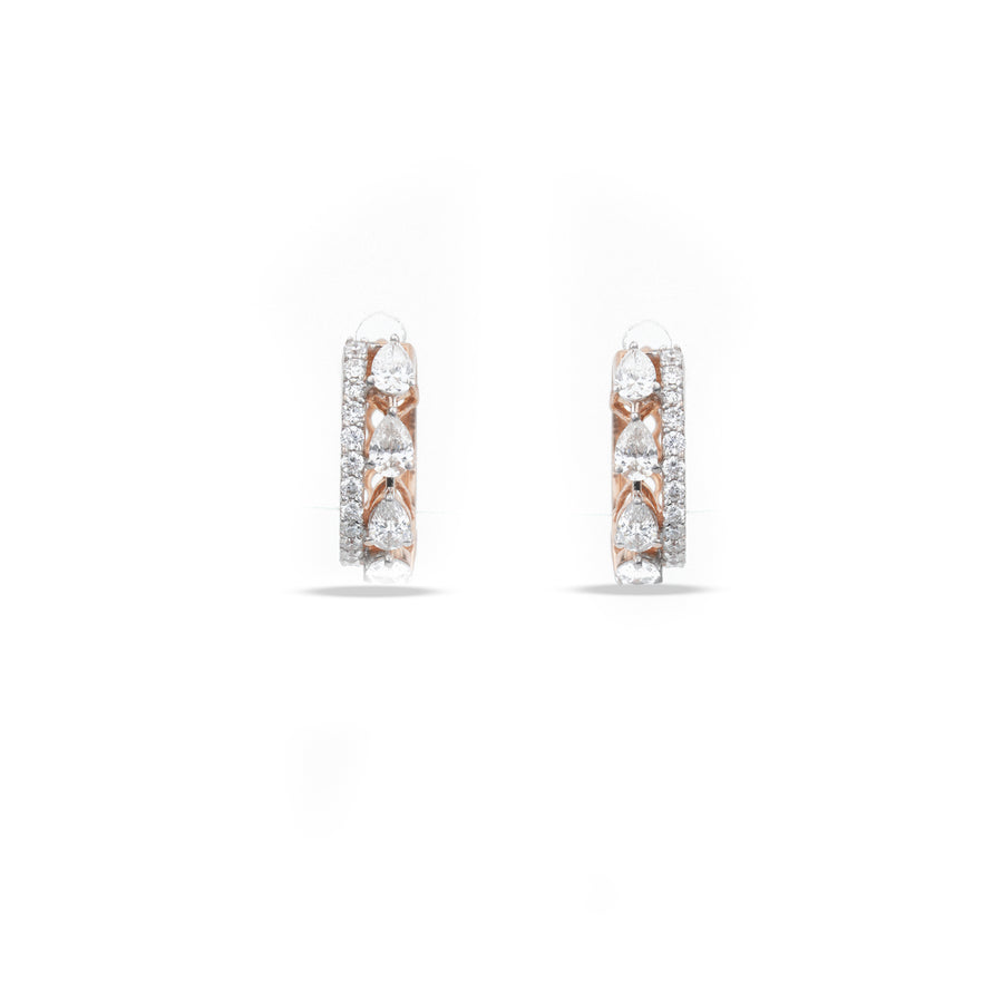 Pear Diamond Pavé Huggie Earrings in rose gold featuring pear-cut lab-grown diamonds with a sparkling pavé border.