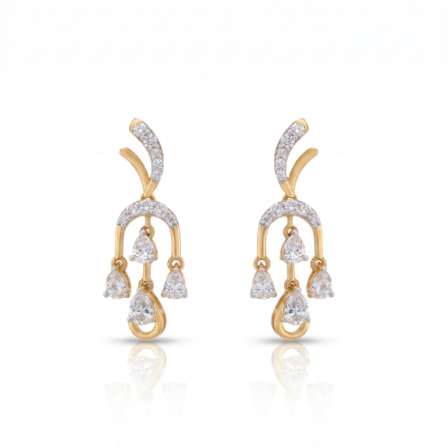 Gold and diamond earrings on a white background