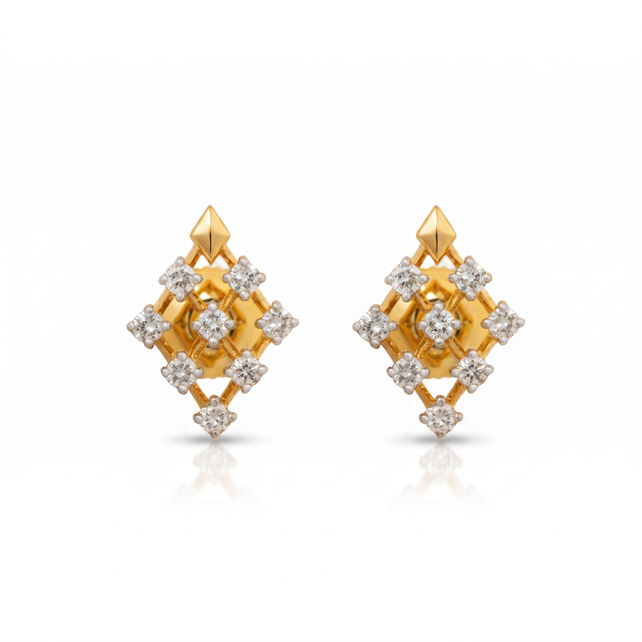 Gold earrings with diamond-like stones on a white background