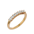 A gold band ring with a row of set diamonds, showcasing a bright and elegant appearance.
