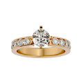 A gold diamond solitaire ring with multiple smaller diamonds on the band, showcasing a brilliant sheen.