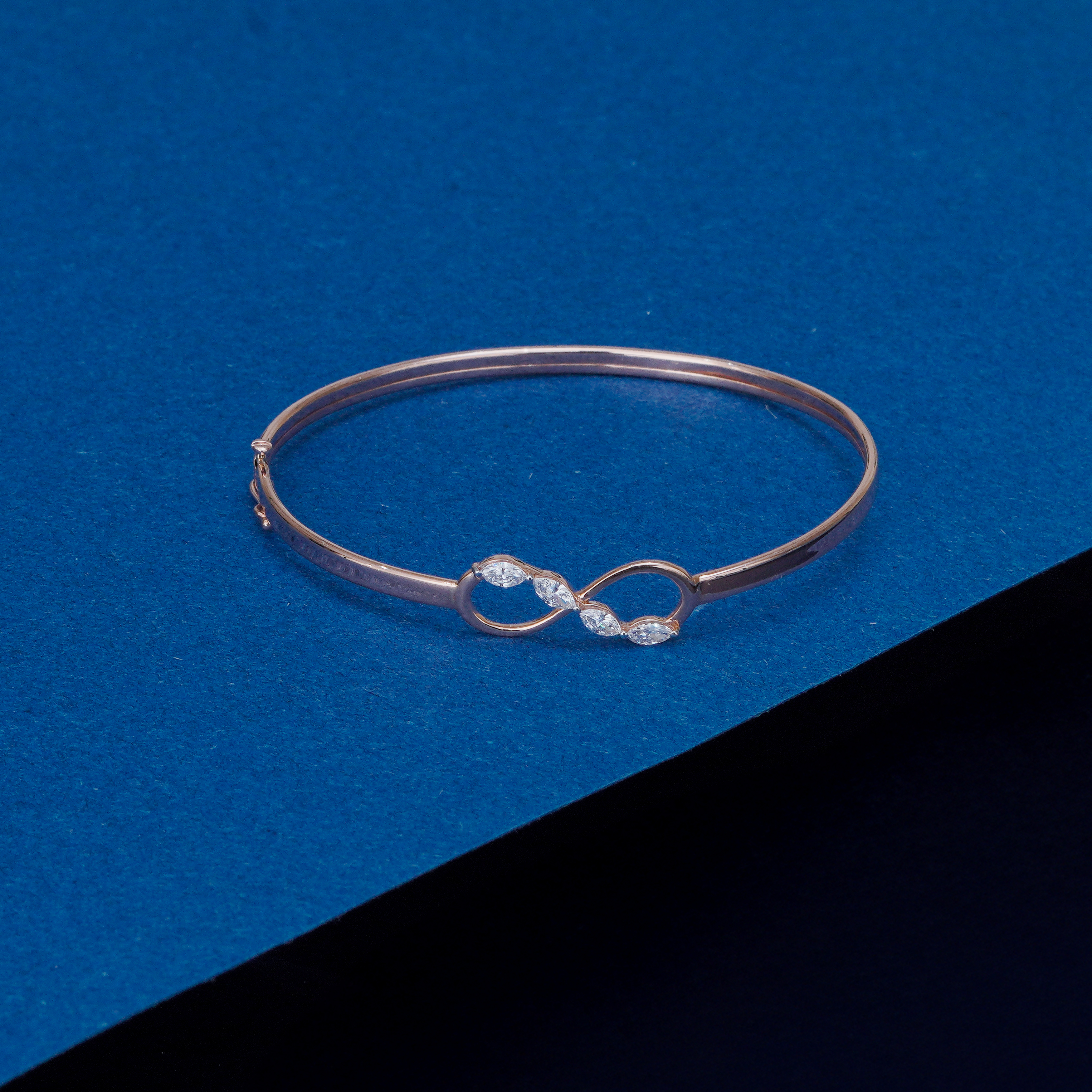 Rose gold infinity lab diamond bangle with marquise-cut lab-grown diamonds